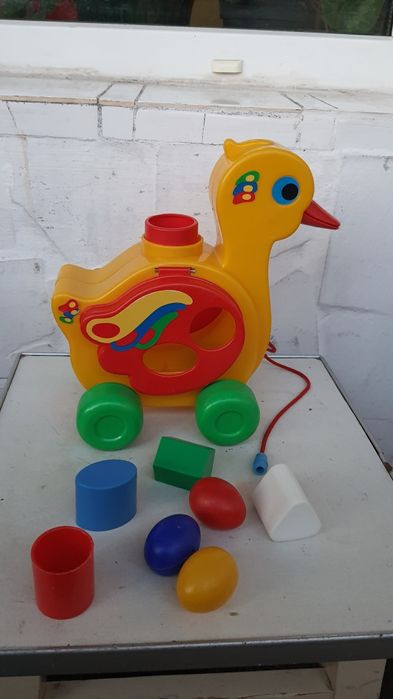 Дитяча розвиваюча іграшка "качечка" на колесиках