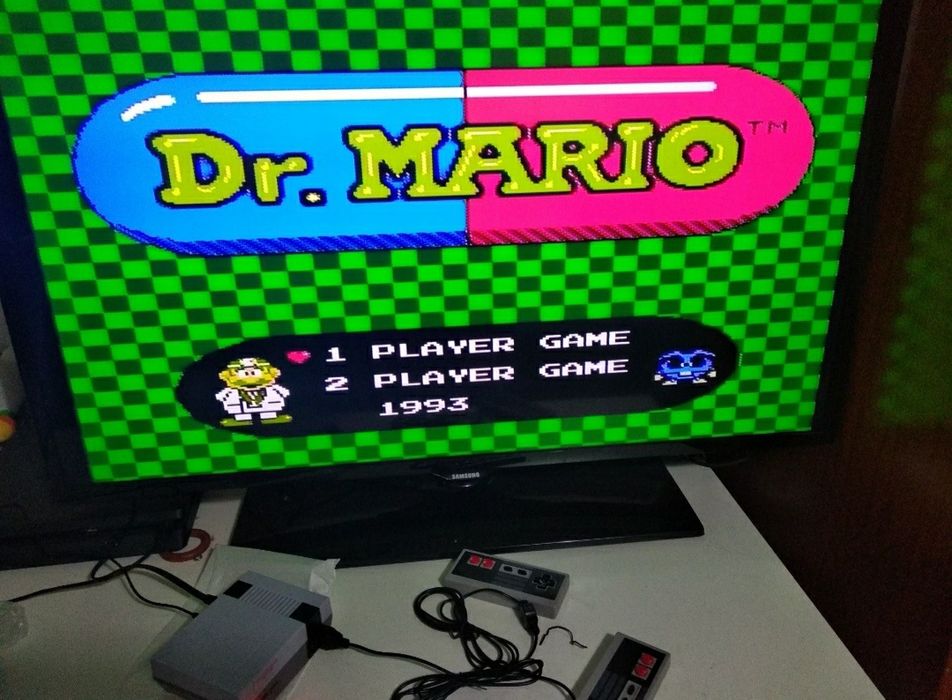 Mini console with 500 games new with 2 controllers64171257309570122