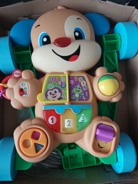 Нові Дитячі ходунки  візочок Fisher price італійською