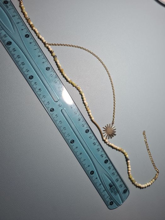 Wisiorek złoty słońce kamień naturalny stal
nierdzewna