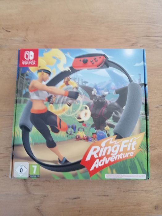 Nintendo Switch OLED + 4 gry