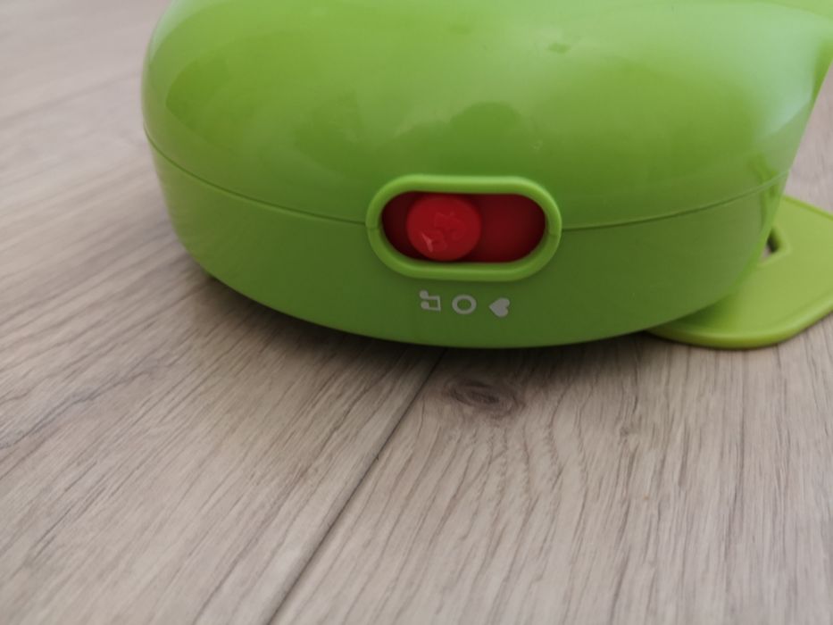 Uspakajacz, szumiś do łóżeczka Fisher Price, zielony. Melodyjki