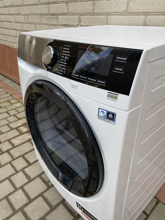 Сушильна  машина AEG T8DS86689