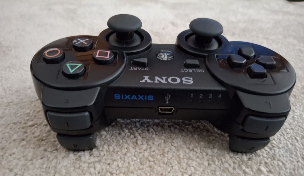 PS3 Fat 40GB (Selo de Garantia Sony) + Comando Original + Jogos