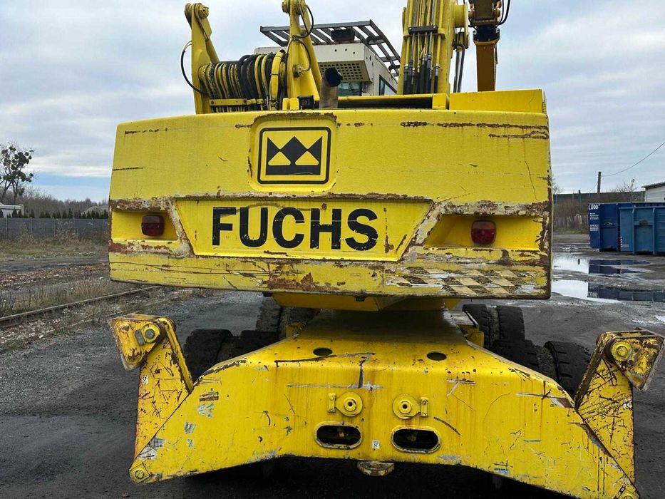 Fuchs MHL 320 + szczypce do demontażu samochodów