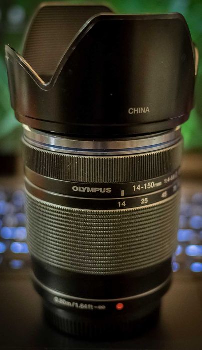 Захищений Olympus M.Zuiko 14-150 2 II 4-5.6 Panasonic 25 1.8 micro 4\3