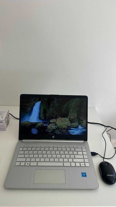Portatil HP DQ008NP