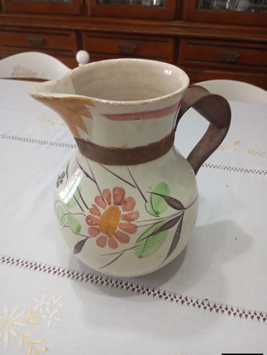 Vendo esta caneca muita bonita bom estado muita antiga