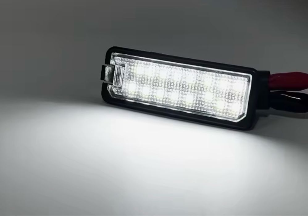 Подсветка номера Skoda Superb освітлення мото