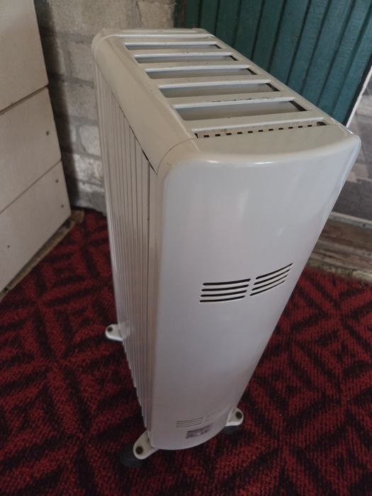 масляний обігрівач DeLonghi 1500w