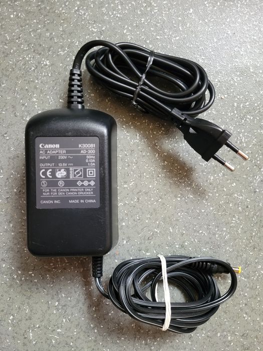 Блок питания 13.5V. 1A. Canon K30081