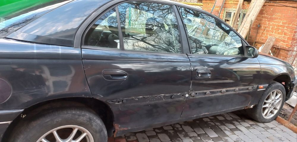 Opel  Omega (по тел)