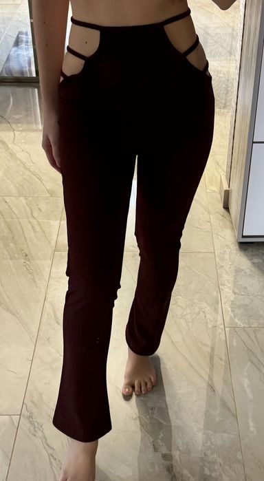 Брюки кльош бордові