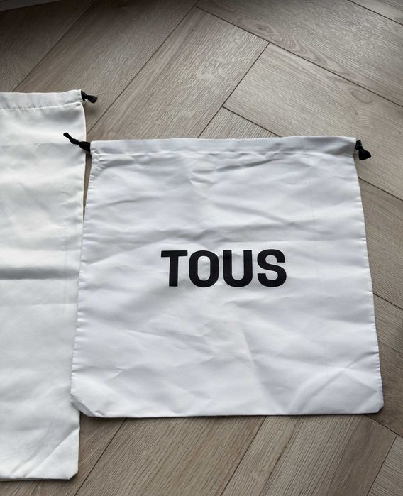 Białe worki firmy Tous