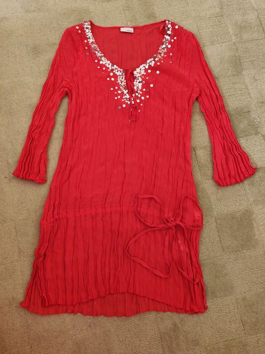 Narzutka w kolorze koralowego różu na kostium w rozmiarze 10 nexta