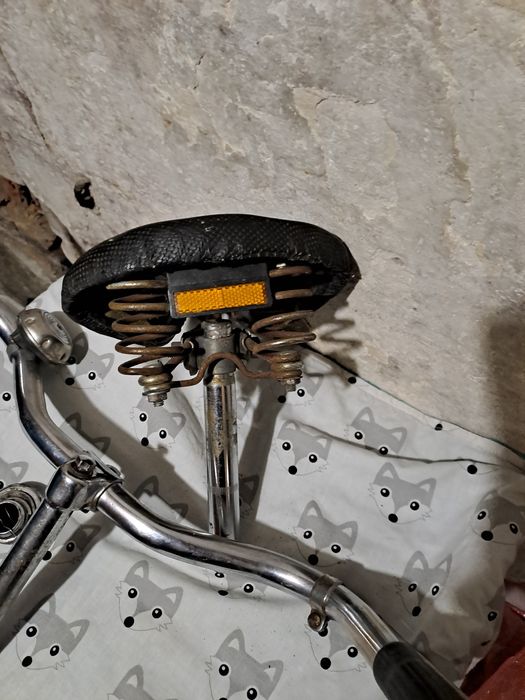 Kierownica z manetką hamulca + siodełko PRl + dwa kółka boczne