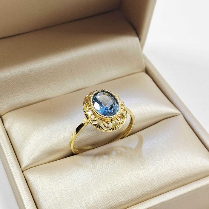 Złoty Pierścionek z Synt. Topazem 585 2,73G R:20