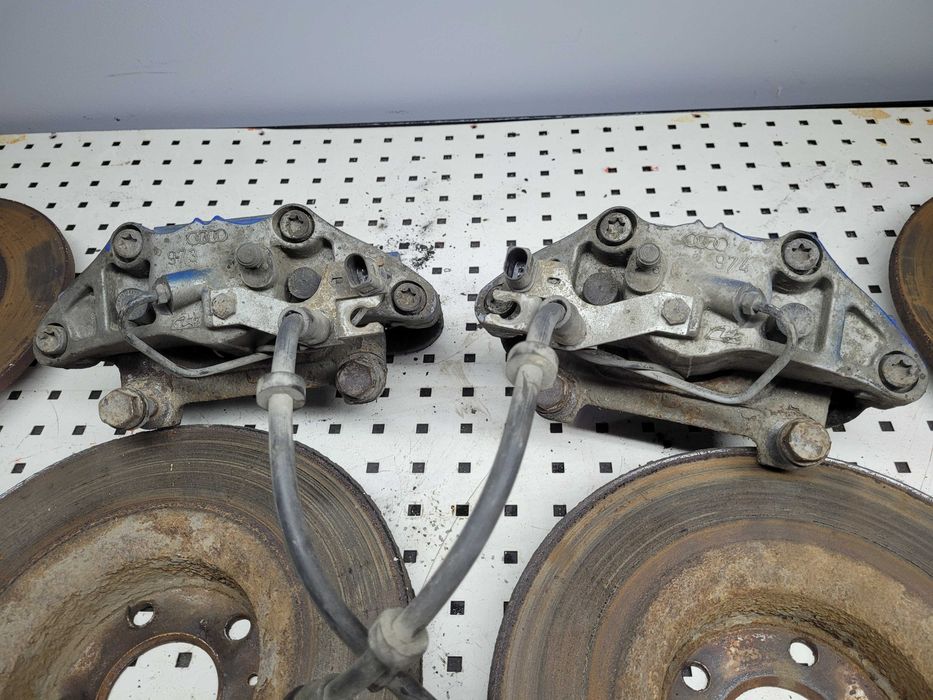 SWAP Hamulców Audi A6 C6 Przód 320mm + Tyl 300 mm Zaciski Tarcze Osłony Jarzmo Klocki