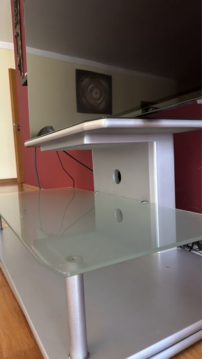 Base de TV rotativa cinza em vidro