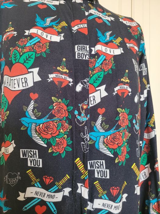 Koszula we wzory  tattoo serca, róże..
Mohito roz 34
Dobra od xs do m