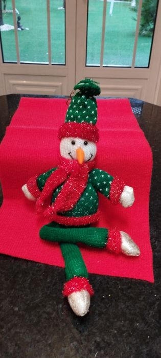 Boneco de neve natalício e laço