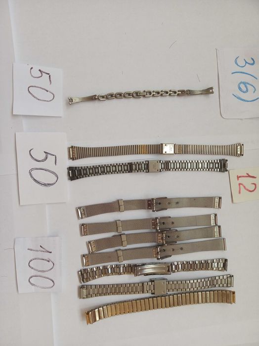Металеві браслети до годинників