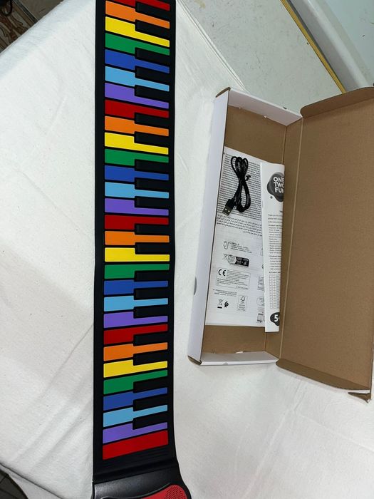 Piano de 49 teclado enrolavel