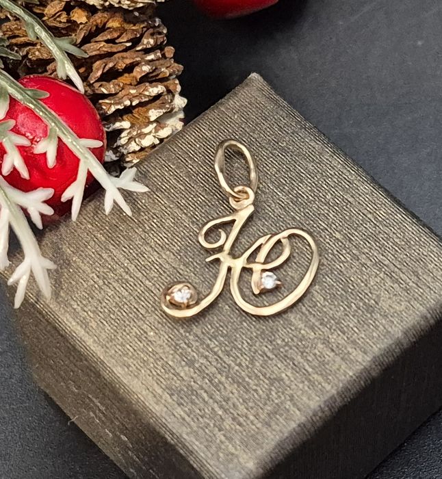 Złota zawieszka14K próby 585 literka "H" z cyrkoniami