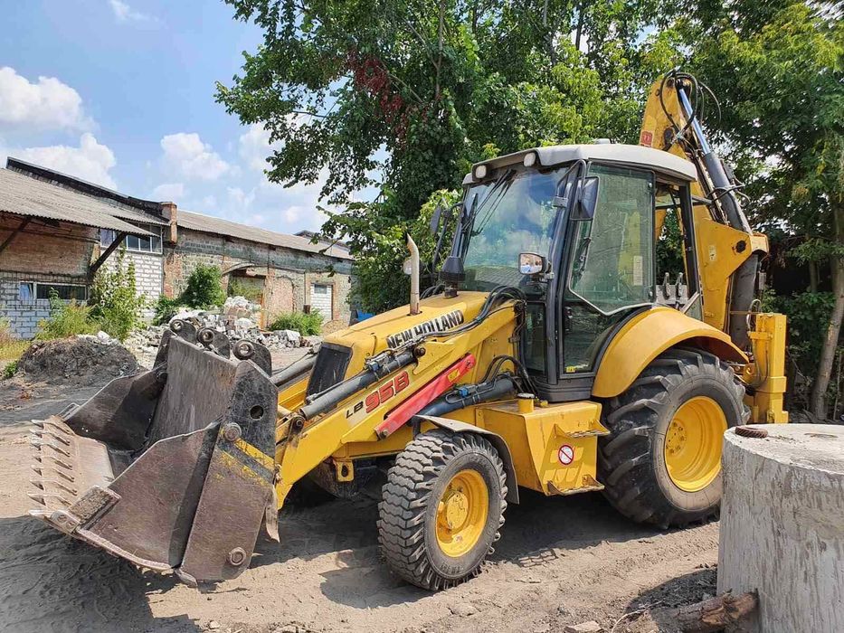 Услуги экскаватора погрузчика,гидромолот