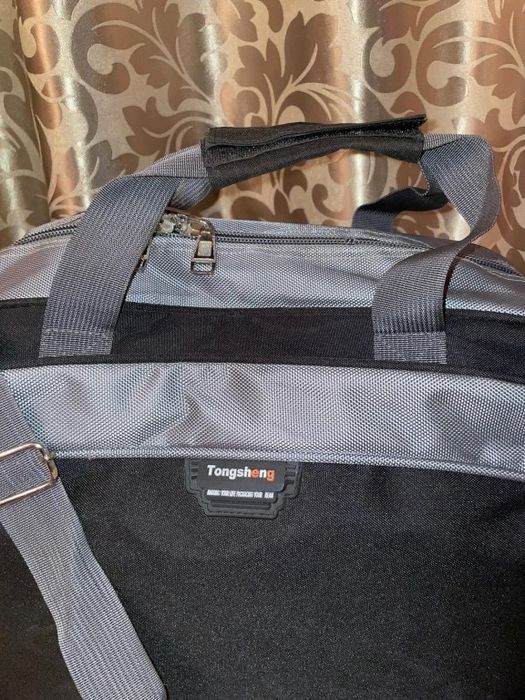 Дорожня вмістка сумка