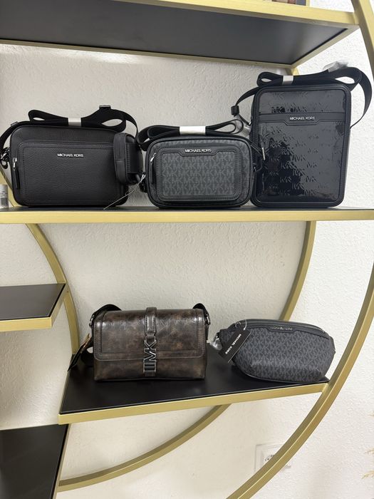 Чоловічі оригінальні сумки Michael Kors