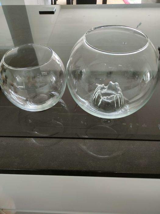 Conjunto de porta velas e aquário.