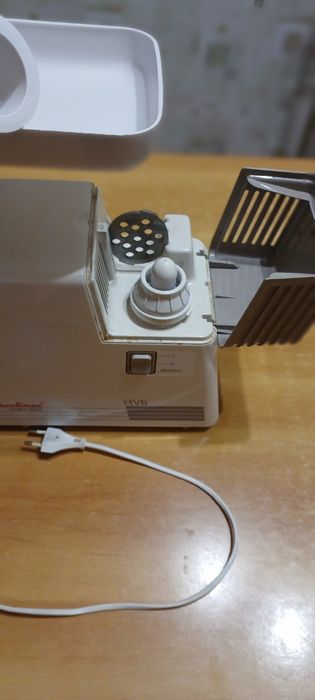 Електрична м'ясорубка.