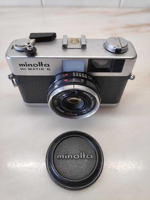 Máquina fotográfica Minolta Hi-Matic G c/ Extras