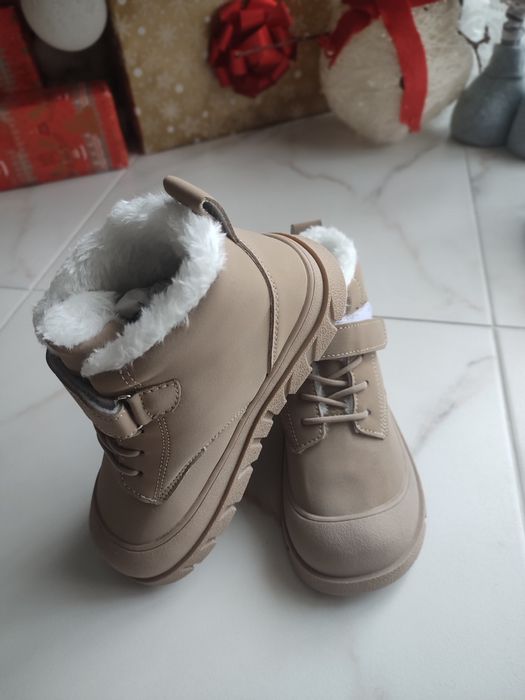 Зимові черевики,  нові