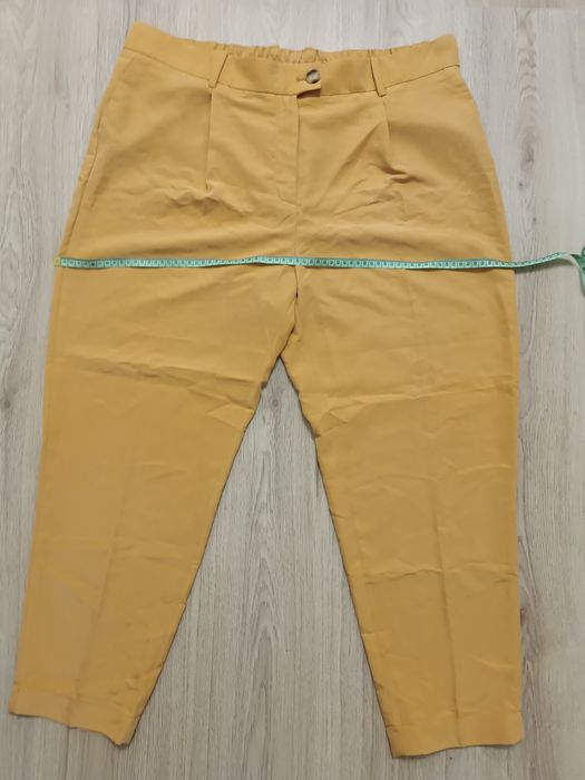 Фирменные брюки Mango