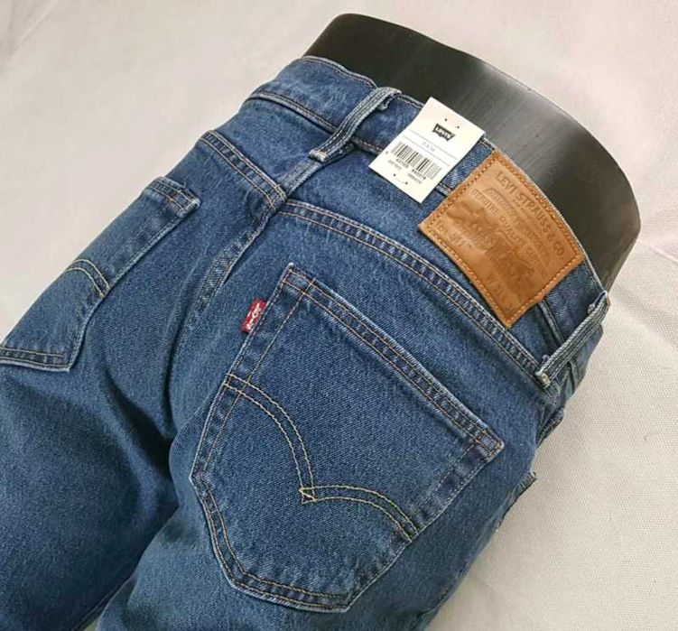 Jeansy Levi's 511 męskie podszyte łaty cerowania nowe Levisy - W31/L34