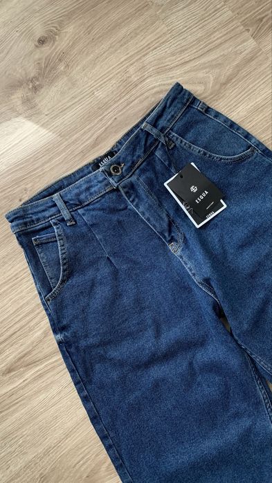 Джинси мом жіночі