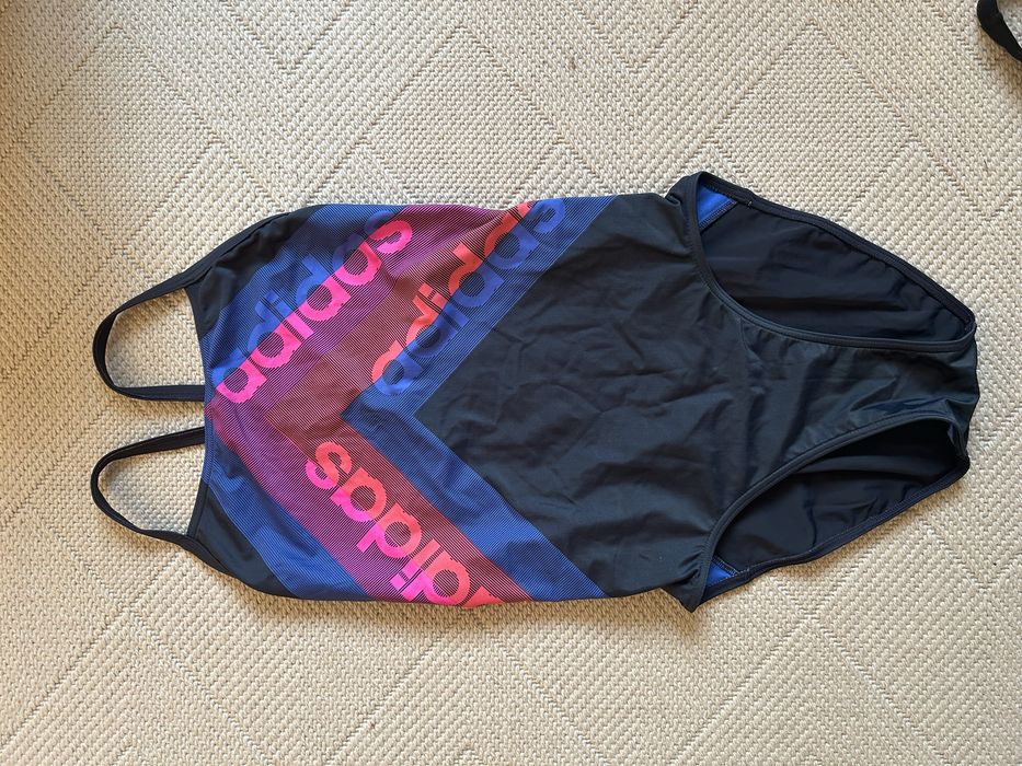 Суцільні купальники adidas