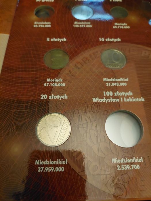 Album klaser z monetami PRL.
