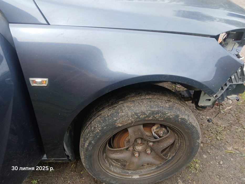 Крила опель астра G H зафіра а б вектра  б с меріва омега інсігнія зад