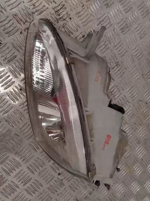 FAROL ESQUERDO HYUNDAI COUPE 1997 -