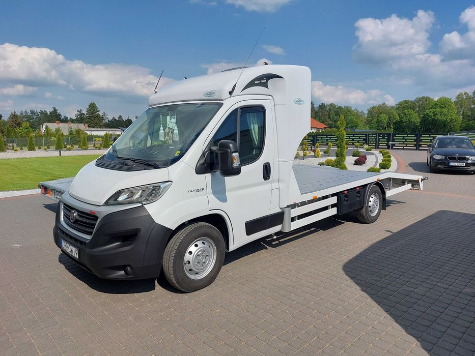 Pomoc drogowa holowanie laweta