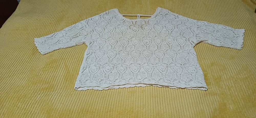 Ażurowy sweterek damski firmy  Reserved