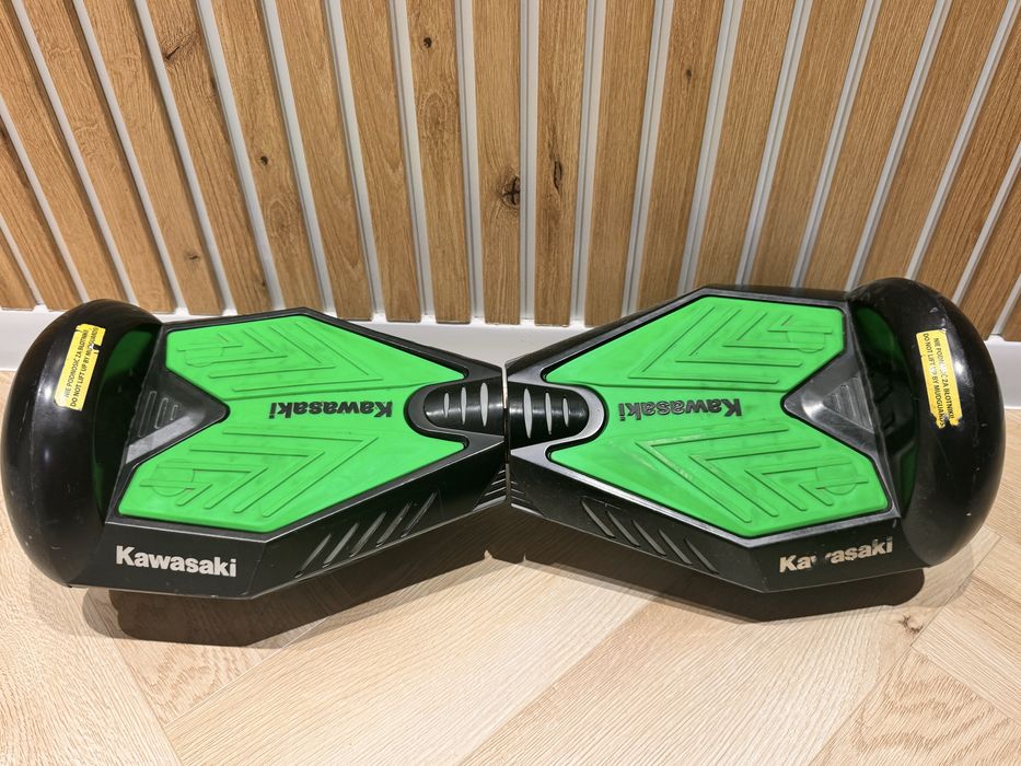 Deskorolka elektryczna Kawasaki z pokrowcem i ładowarką