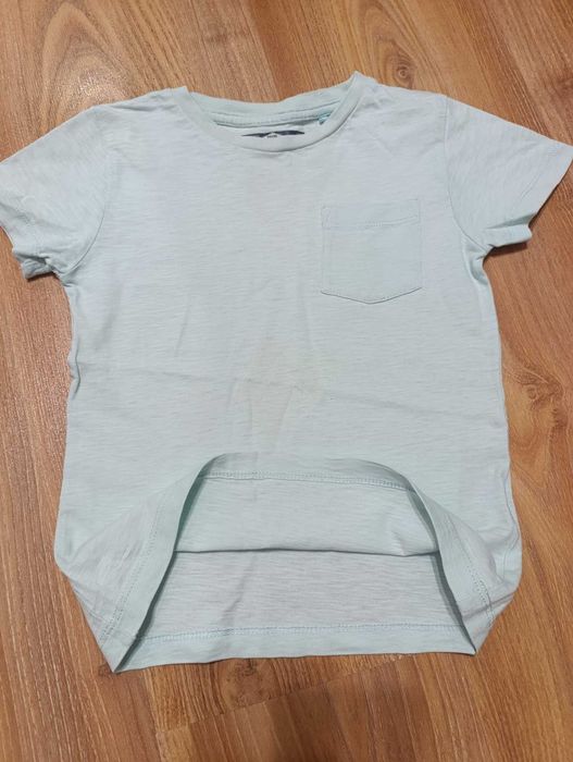 Дитяча футболка світло-м’ятного кольору з кишенею — стиль та комфорт!