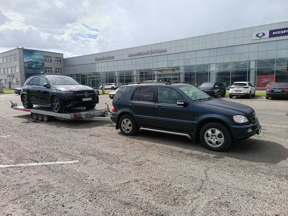 Доставка авто перевозка авто в Україну Автовоз евакуатор лафет