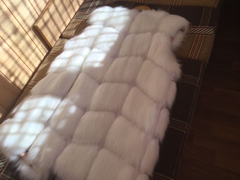 Женский меховой жилет