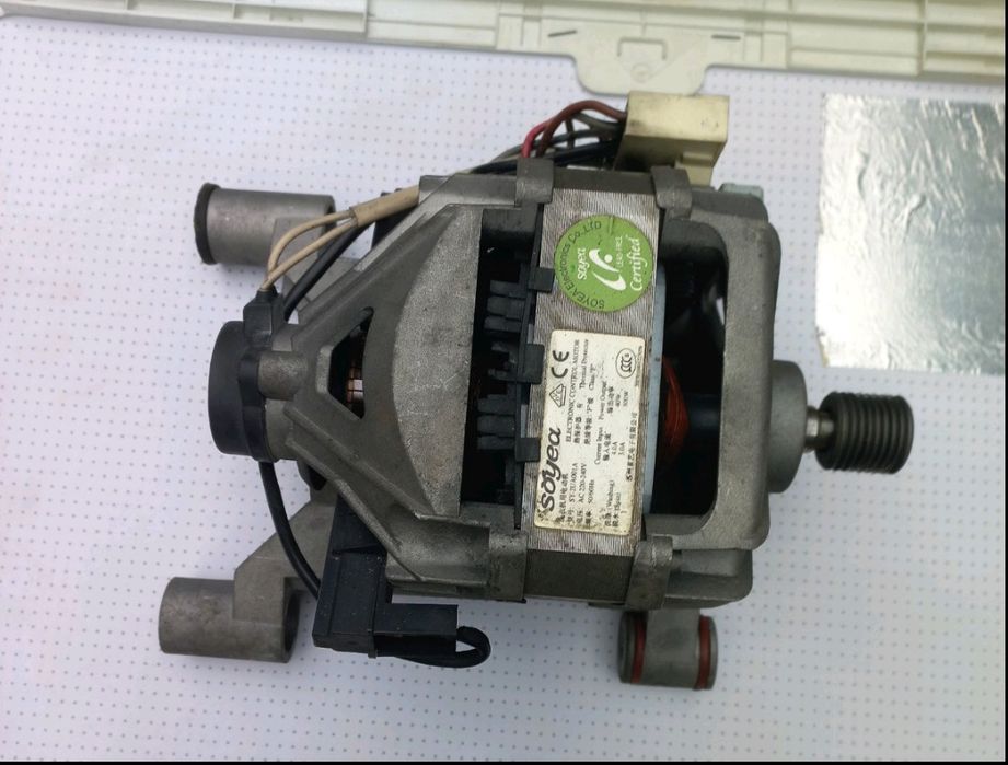 Двигатель стиральной машины.