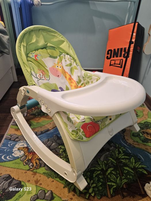 Leżaczek bujaczek dla dziecka z pałąkiem i stolikiem – bardzo dobry